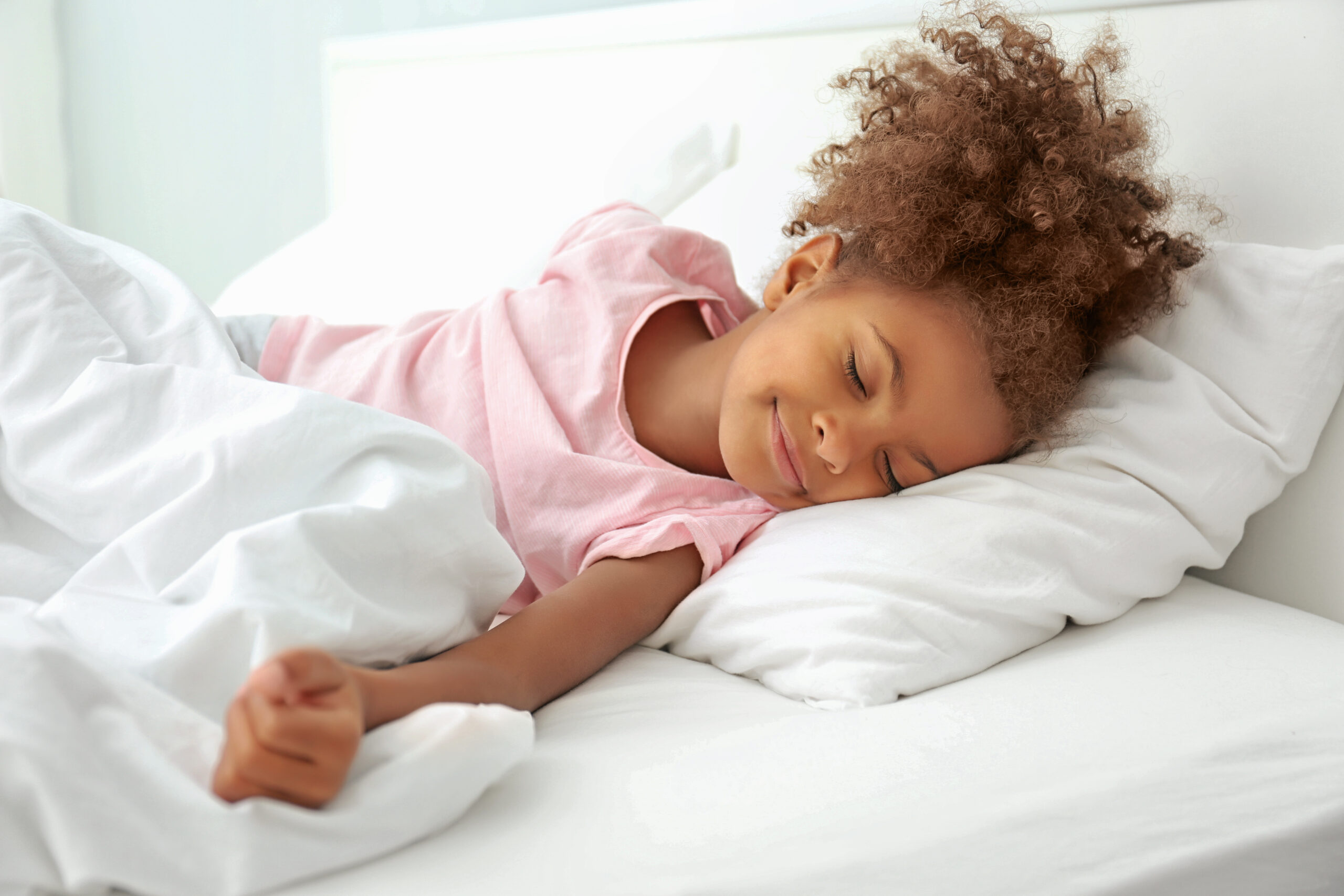 Little,African,American,Girl,Resting,In,Bed
