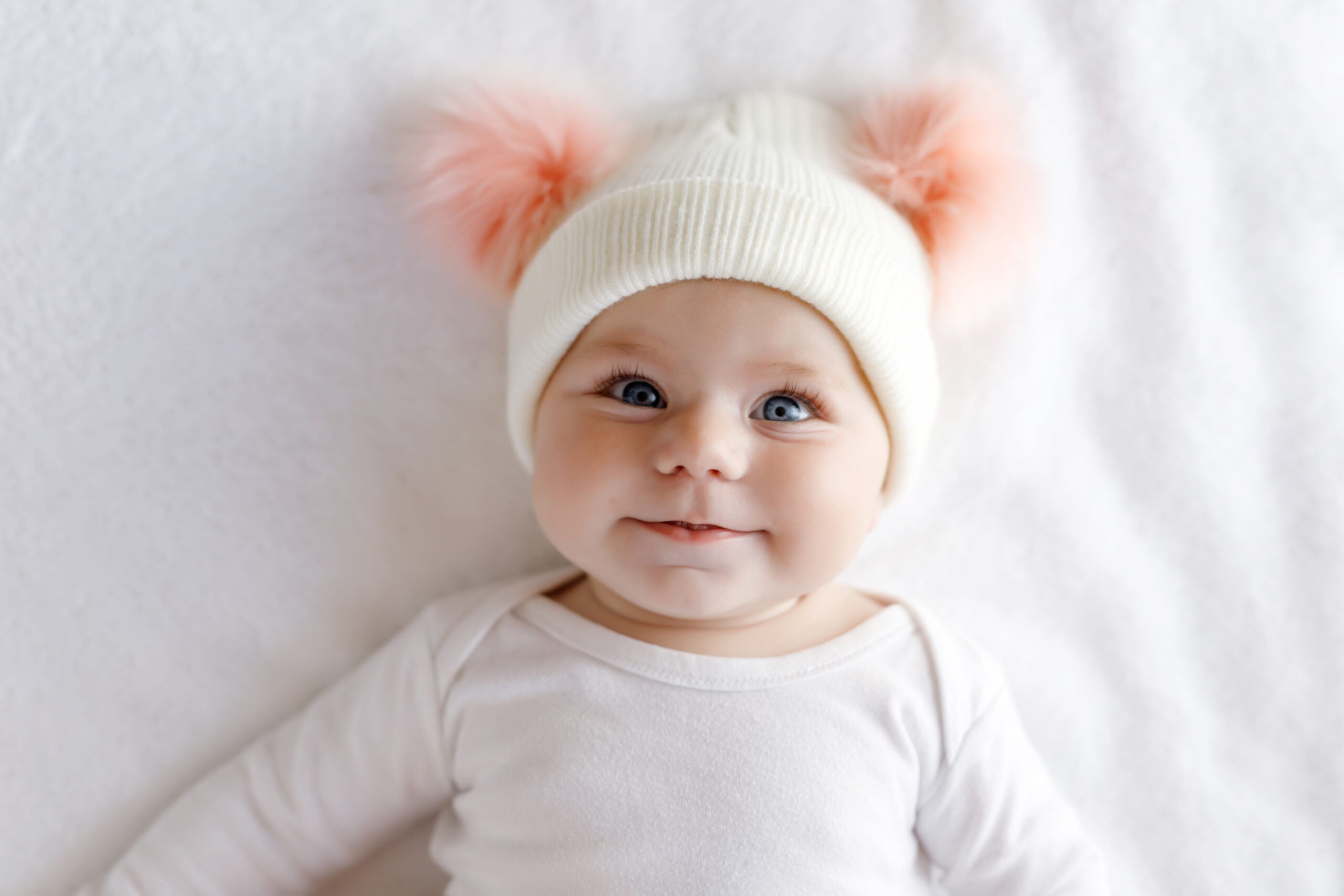 cute baby awake cute baby laying in bed