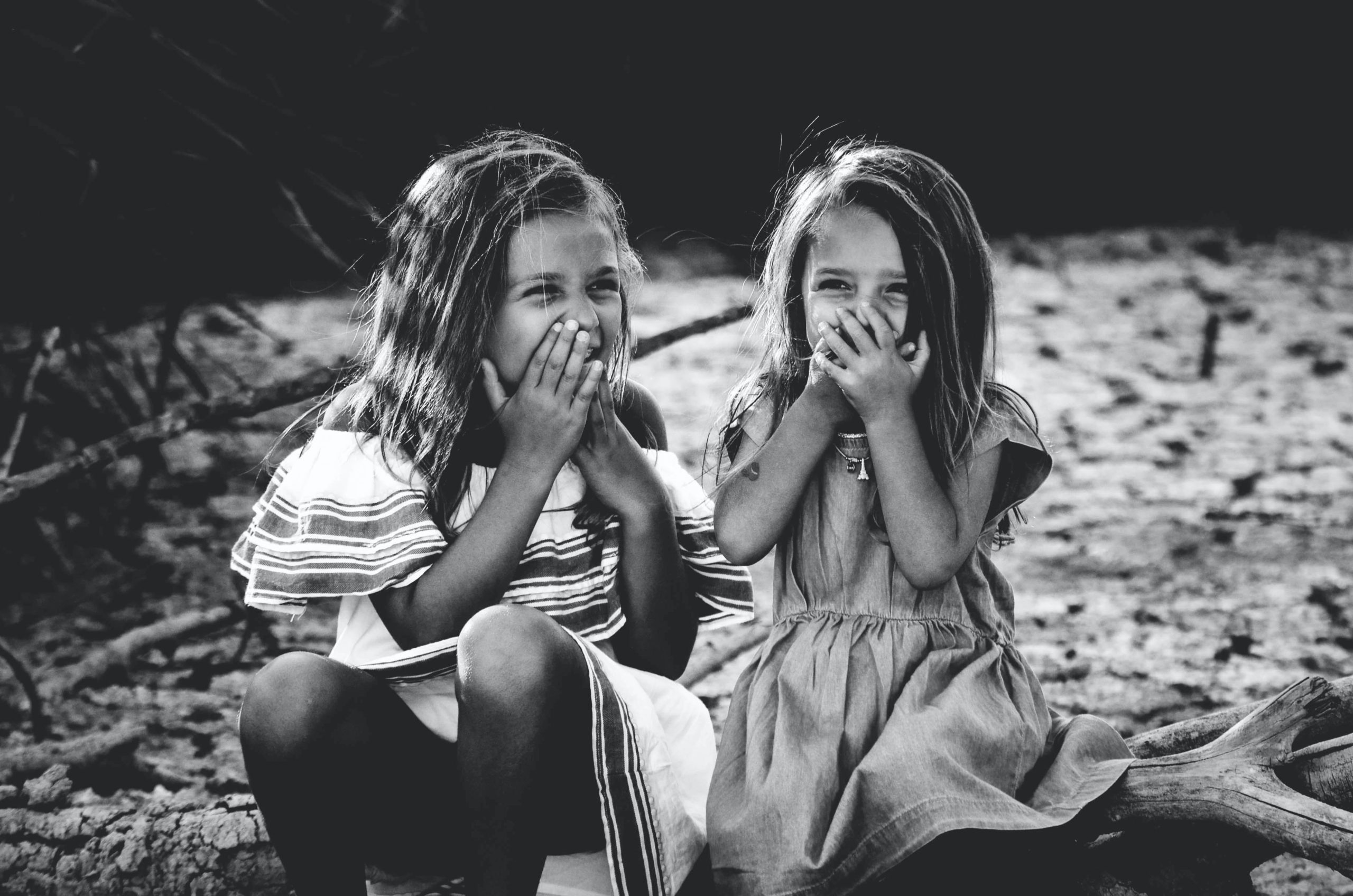 toddler girls laughing